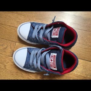 Converse. Blue with red interior.